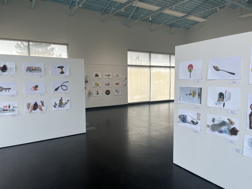 art gallery room with media displayed on walls